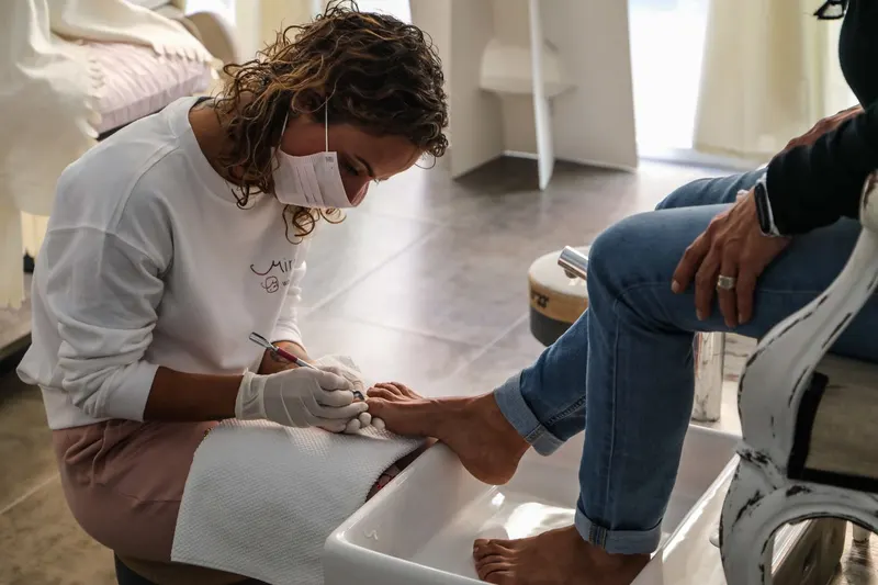 A pedicure being finished at the salon